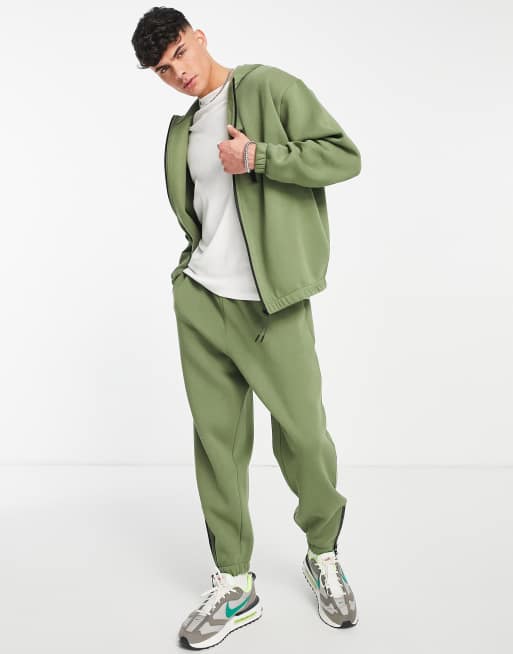 ASOS DESIGN - Joggers oversize kaki con bordi sportivi con zip in coordinato