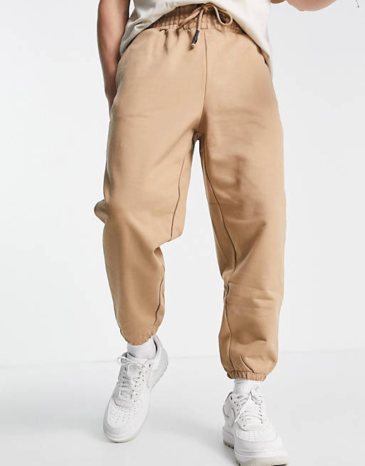 Joggers oversize beige Asos Uomo Abbigliamento Pantaloni e jeans Pantaloni Joggers 