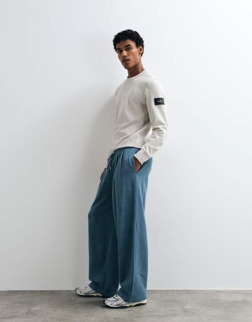 ASOS DESIGN - joggers oversize tipo balloon con lavado ácido en azul