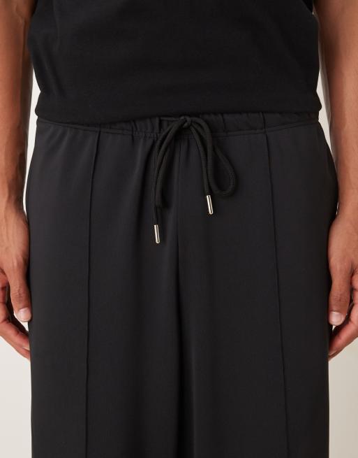 ASOS DESIGN - Joggers pesanti affusolati neri in tessuto effetto scuba con pinces, 4 di 5