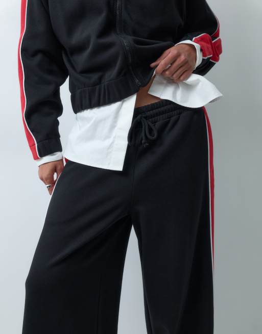 ASOS DESIGN joggers sportivi in piqué con pannelli rossi e neri, 5 di 5