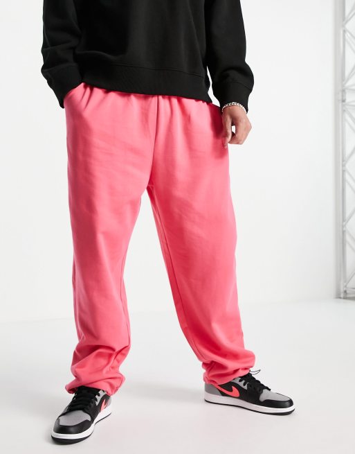 ASOS DESIGN - Joggers super oversize con fermacorda sul fondo rosa in coordinato