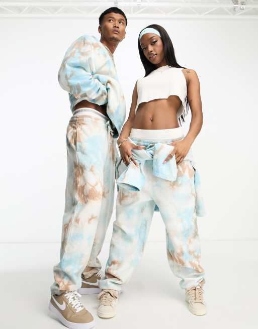 ASOS DESIGN - Joggers unisex comodi blu tie-dye in coordinato 