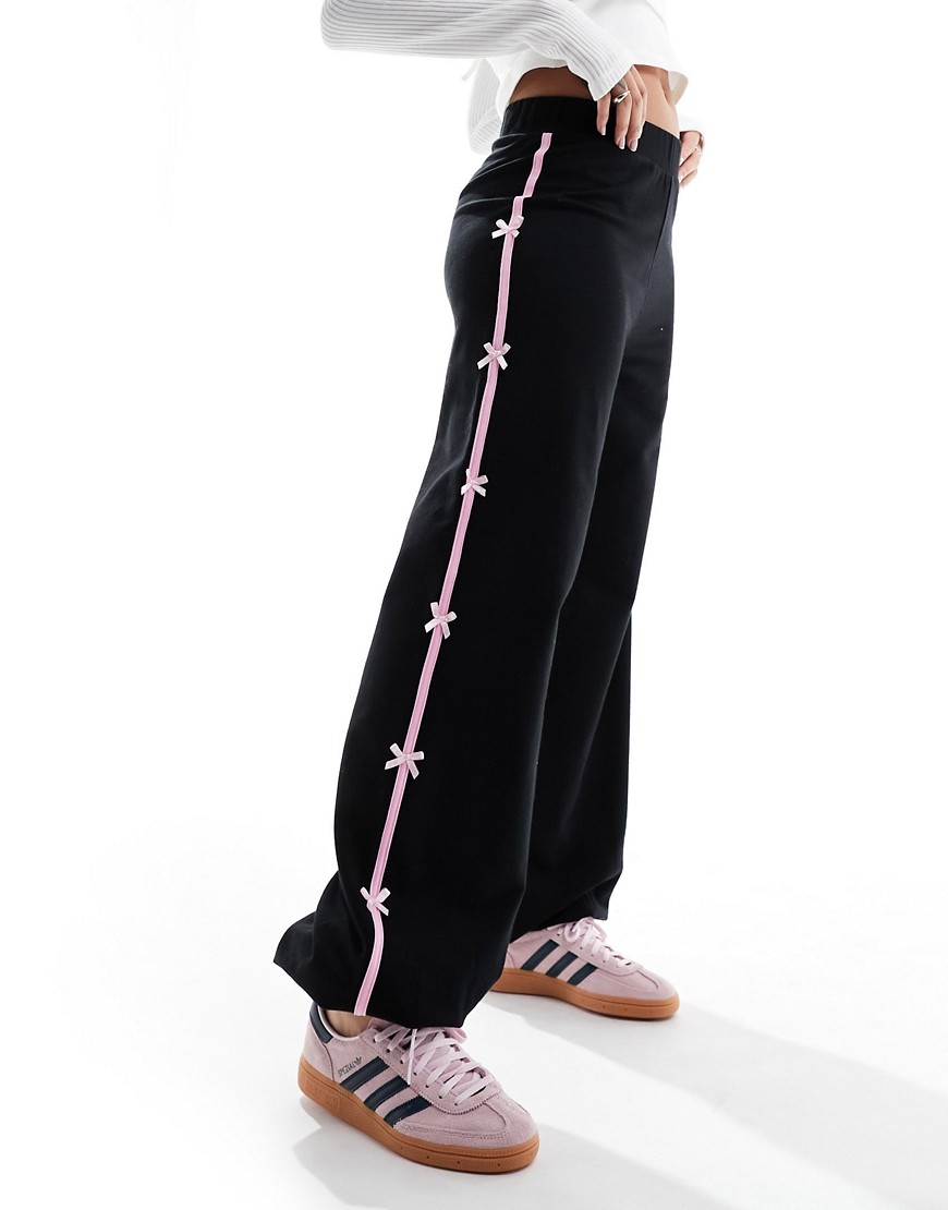 ASOS DESIGN joggers with bow side stripe in black