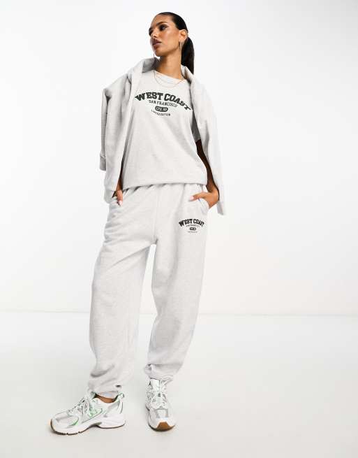 ASOS DESIGN – Joggersy oversize w jasnoszarym melanżowym kolorze z napisem „West Coast”, część zestawu