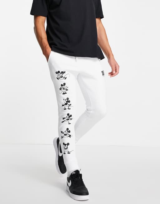 ASOS DESIGN - Joggingbroek met glanzende print van Mickey Mouse in wit, deel van co-ord set