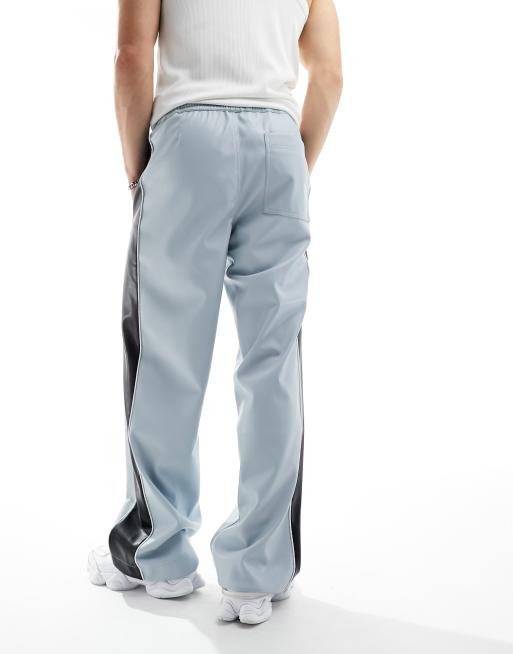 ASOS DESIGN - Joggingbroek met leerlook in blauw met zijstreep, 2 van 5