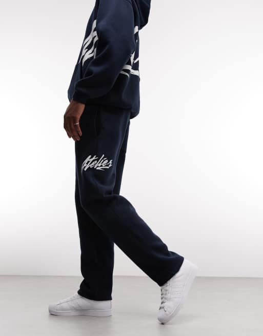 ASOS DESIGN - Joggingbroek met rechte pijpen en tekstprint in marineblauw, 2 van 5