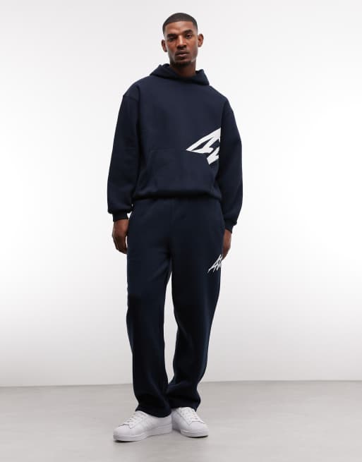 ASOS DESIGN - Joggingbroek met rechte pijpen en tekstprint in marineblauw, 3 van 5