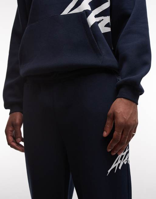 ASOS DESIGN - Joggingbroek met rechte pijpen en tekstprint in marineblauw, 4 van 5