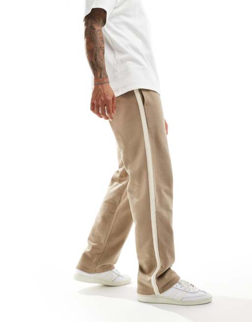 ASOS DESIGN - Joggingbroek met wijde pijpen en bies aan de zijkant in stone