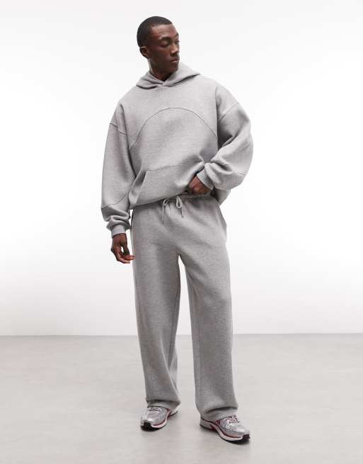 ASOS DESIGN - Co-ord set van oversized hoodie en joggingbroek met wijde pijpen en gestikte vlakken in gemêleerd grijs, 2 van 3