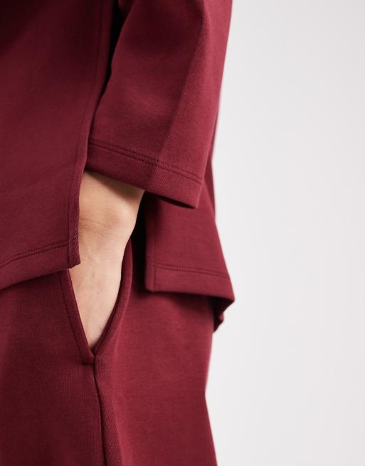 ASOS DESIGN - Joggingbroek met wijde pijpen en interlocknaden in bordeauxrood, 3 van 5