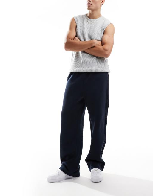 ASOS DESIGN - Joggingbroek met wijde pijpen en plooi in marineblauw, 2 van 5