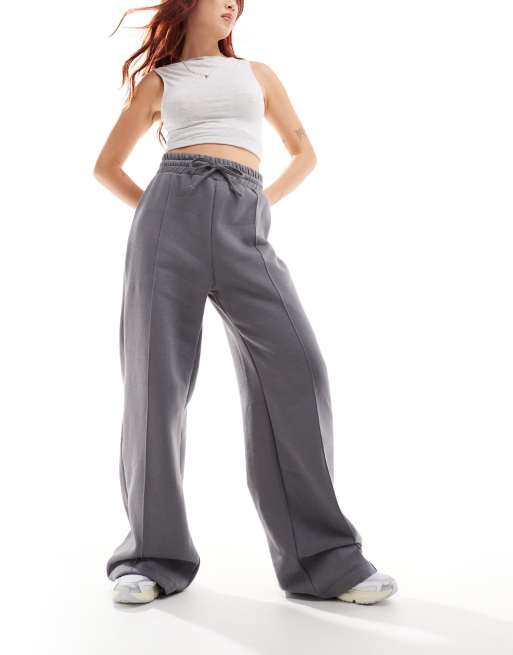ASOS DESIGN - Joggingbroek met wijde pijpen en siernaad in antraciet