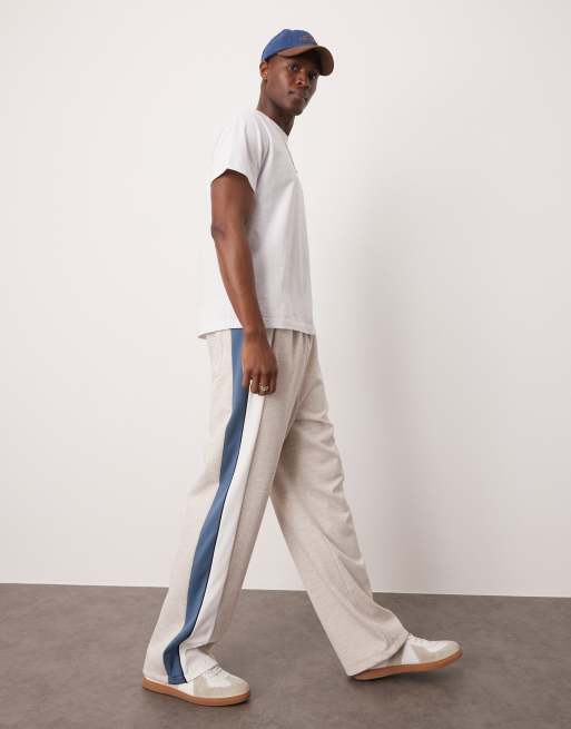 ASOS DESIGN - Joggingbroek met wijde pijpen en zijpanelen met kleurvlakken in grijs