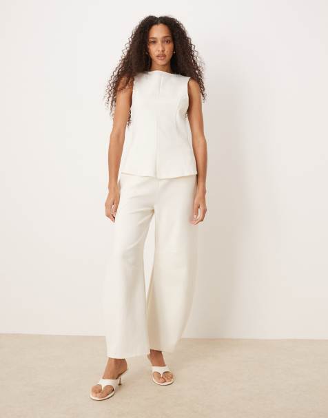 ASOS DESIGN - Joggingbroek met wijde ronde pijpen en interlock-naden in wit, deel van co-ord set - view 1