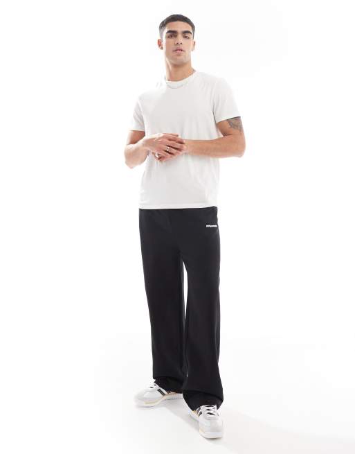 ASOS DESIGN - Joggingbroek wijde pijpen, tech rits en print in zwart