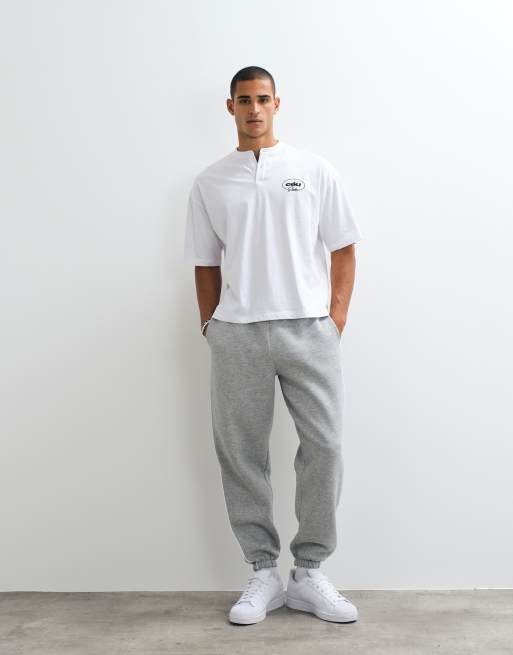 ASOS DESIGN joggingbyxor med uppvikta benslut och passpoal i gråmelerad, 3 av 5