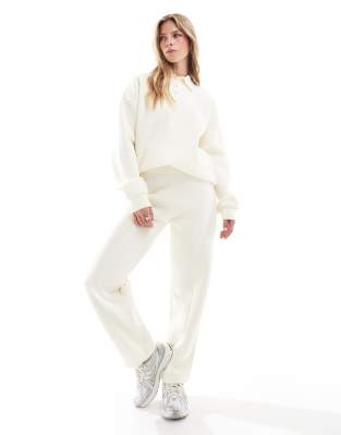 ASOS DESIGN - Jogginghose in Buttermilchgelb mit Ziernaht