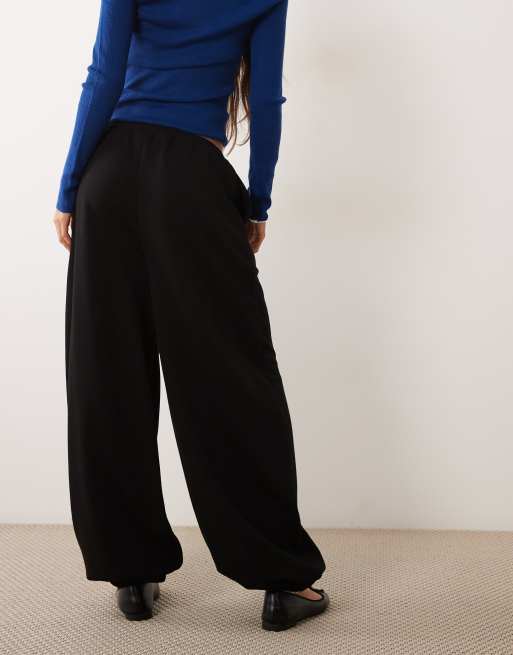 ASOS DESIGN Jogginghose in lockerer Passform in Schwarz, 4 von 5