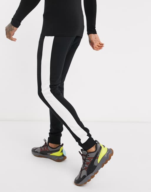 ASOS DESIGN Jogginghose in Schwarz mit engem Schnitt und seitlichem Streifen BLACK ASOS