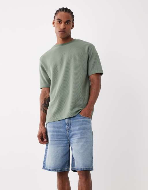 ASOS DESIGN - Jorts in denim taglio medio lavaggio chiaro blu