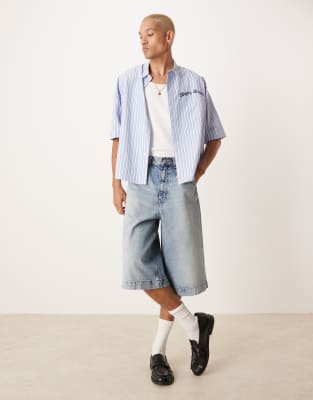 ASOS DESIGN - Jorts taglio lungo blu lavaggio chiaro sfumato