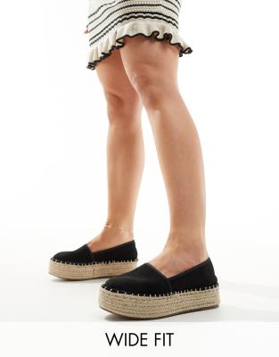 ASOS DESIGN - Journal - Espadrilles in Schwarz mit flacher Plateausohle in weiter Passform