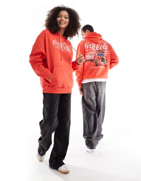 ASOS DESIGN – Jul – Röd hoodie i unisex-modell och oversize med juligt Coca Cola-tryck - view 1