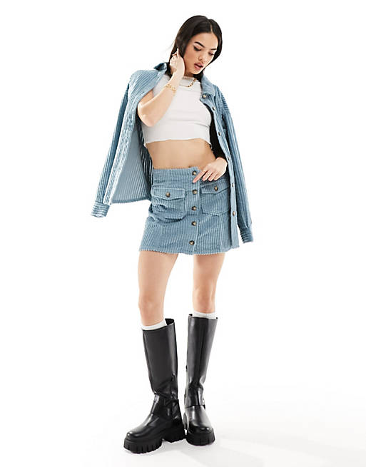 ASOS DESIGN jumbo cord button through mini skirt in blue | ASOS