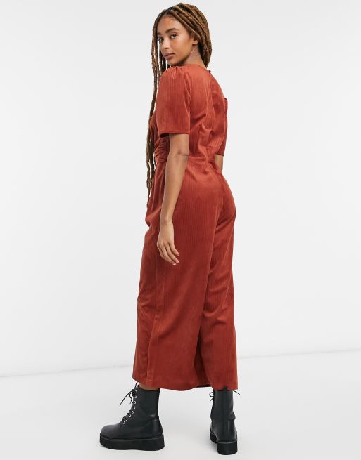 ASOS DESIGN Jumpsuit aus Cord mit geknotetem Vorderteil in Braun ASOS