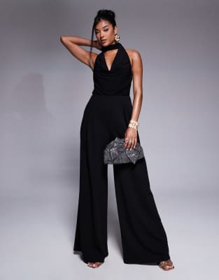 ASOS DESIGN - Jumpsuit aus Materialmix in Schwarz mit weitem Bein, Wasserfallausschnitt und Bindedetail am Ausschnitt