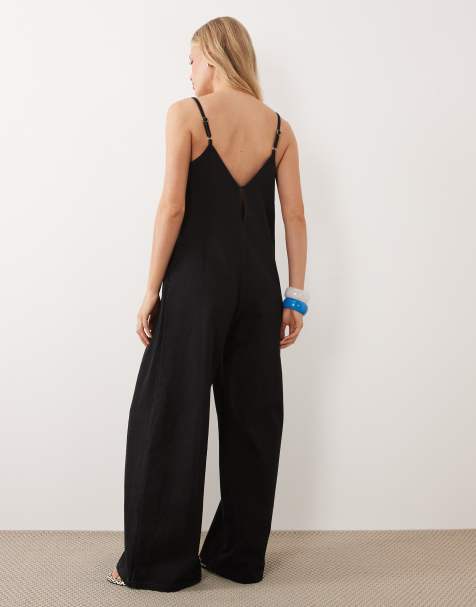 ASOS DESIGN – Jumpsuit aus weichem Denim in Schwarz mit weitem Bein - view 1