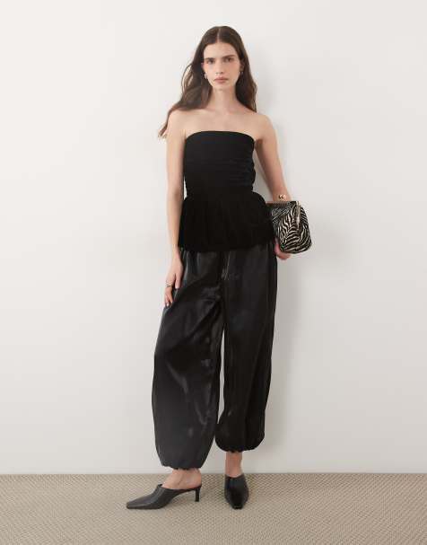ASOS DESIGN jumpsuit i sammet med bandeau och ballongbyxor i chiffong, svart - view 1