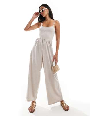 ASOS DESIGN - Jumpsuit in Hellbeige mit Riemchenträgern, weitem Bein und U-Ausschnitt-Neutral