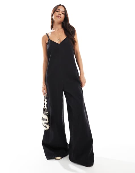 ASOS DESIGN - Jumpsuit med dyb rund hals og vide ben i blød denim i sort vask - view 1
