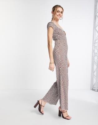 ASOS DESIGN - Jumpsuit met keyhole opening met clipje in golvende blokjesprint