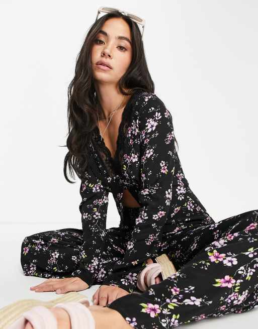 ASOS DESIGN Jumpsuit mit Spitzenbesatz durchgehender Knopfleiste und Grunge Blumenmuster ASOS