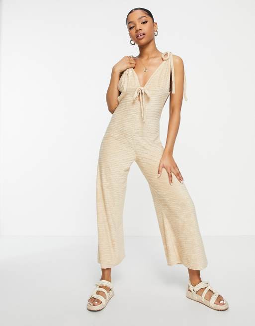 ASOS DESIGN - Jumpsuit van badstof met V-hals en gestrikte schouders in beiges