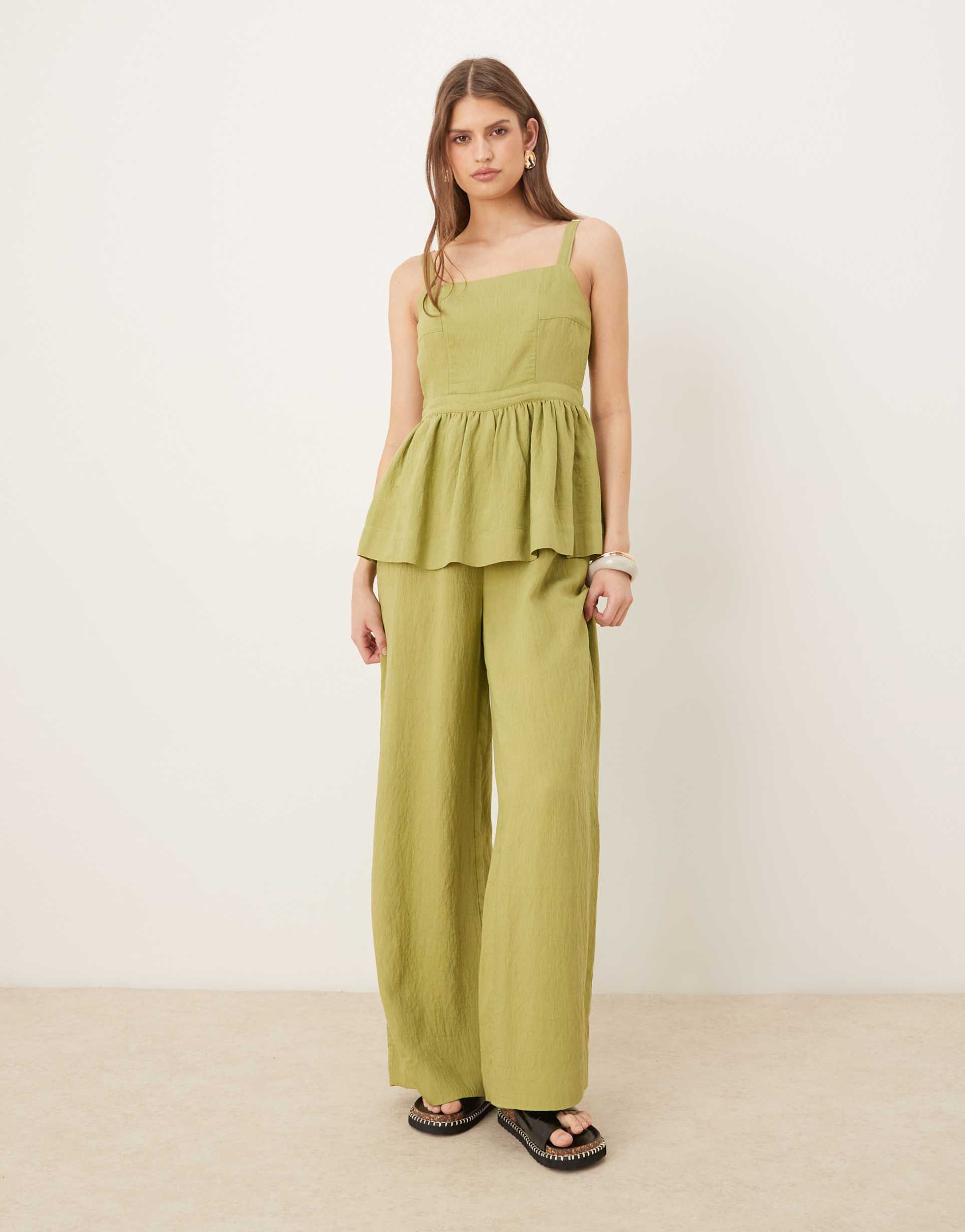 asos design jumpsuit with peplum waist in olive green