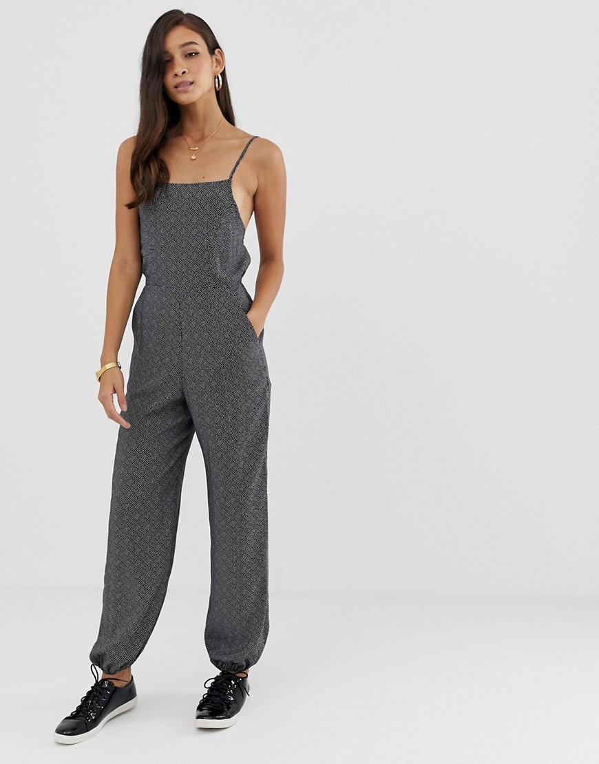 ASOS DESIGN jumpsuit with strappy back and elasticated cuffs in spot print-Multi