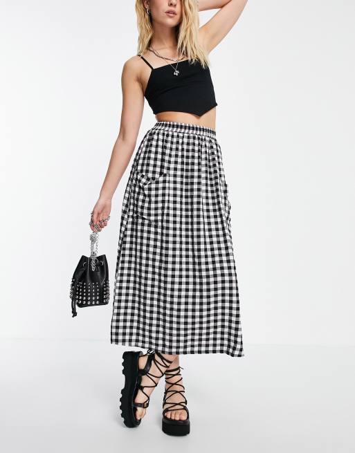 ASOS DESIGN - Jupe mi-longue à poches latérales et imprimé carreaux vichy texturé - Monochrome
