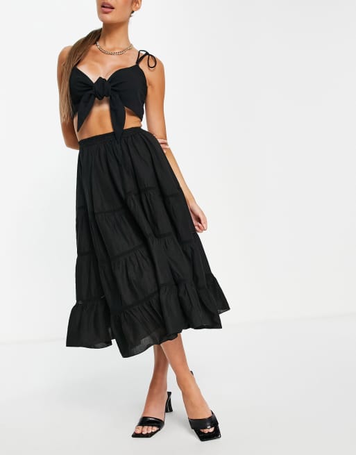 ASOS DESIGN - Jupe mi-longue avec empiècement dentelle et ourlet en pointe - Noir