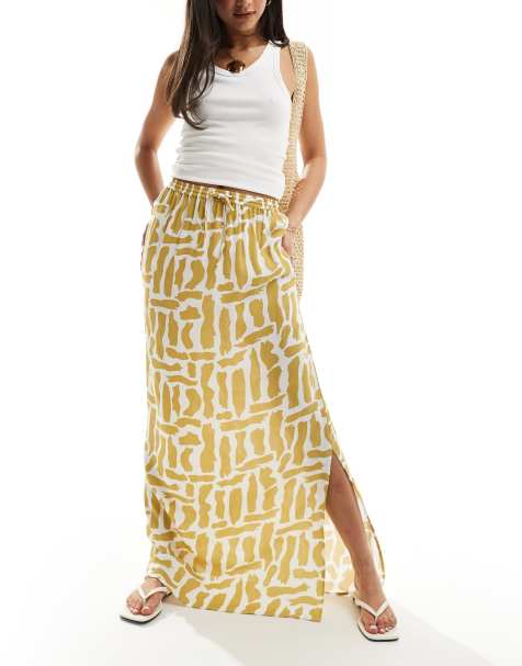ASOS DESIGN - Jupe mi-longue nouée à la taille avec imprimé tortillons - Moutarde - view 1