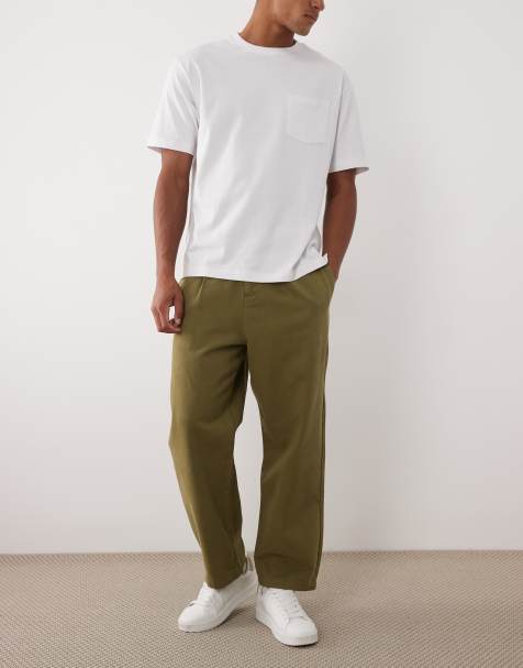 ASOS DESIGN – Kakifärgade, avsmalnande byxor med avslappnad passform och veck - view 1