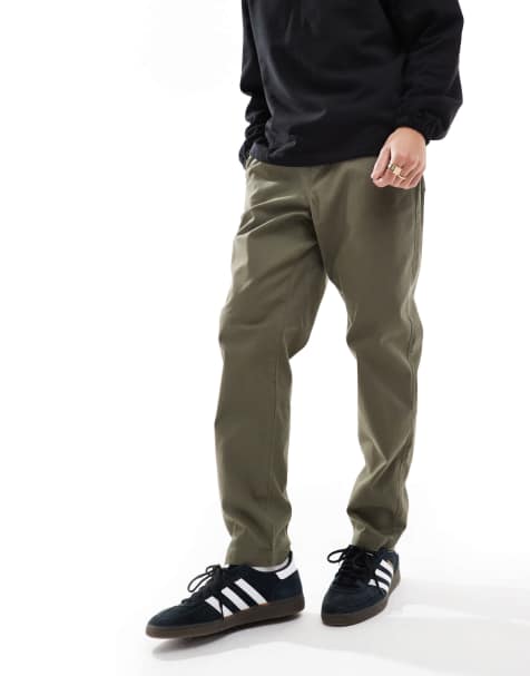 ASOS DESIGN – Kakifärgade, avsmalnande chinos med elastisk midja - view 1