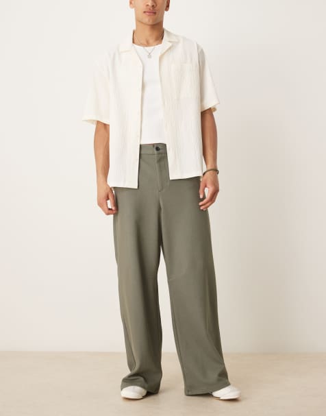 ASOS DESIGN – Kakifärgade finbyxor i twill med hästskodesign - view 1