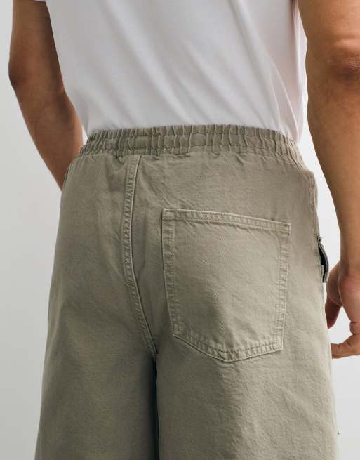 ASOS DESIGN – Kakifärgade jeansshorts i cargostil med ledig passform och vintagetvättad finish , 4 av 9