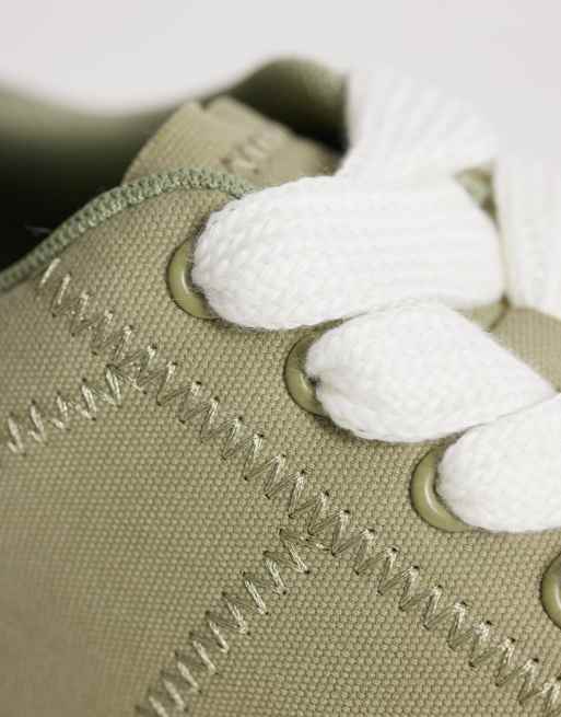 ASOS DESIGN – Kakifärgade sneakers i canvas med snörning och dekorativ söm, 4 av 5
